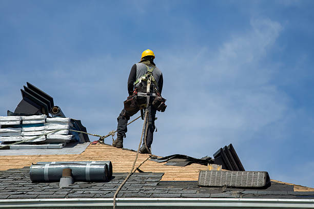 Professional Roof Replacement technician working in Warrenton, OR